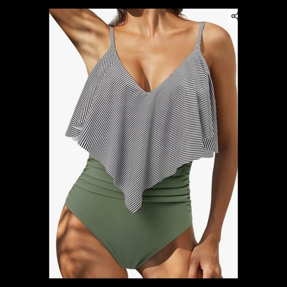 Other - Straight black and white top green bottom one piece swimsuit.